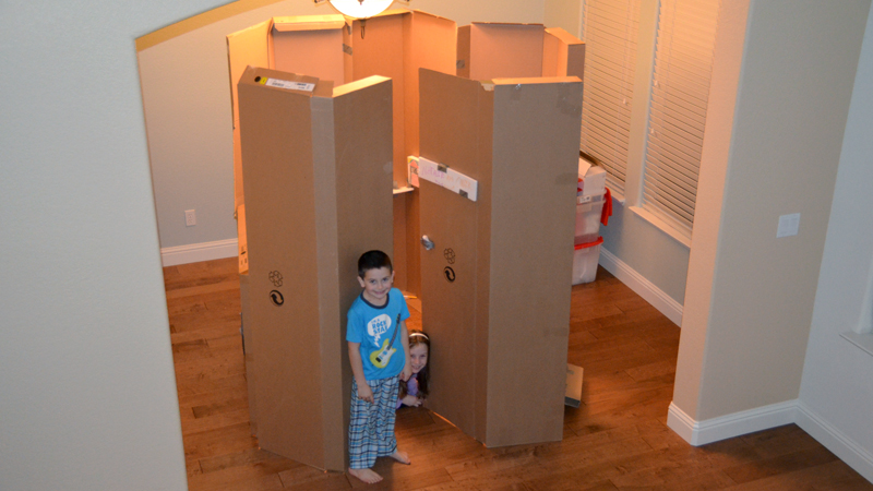 Putting Old Ikea Cardboard to Use To Build Huge Forts