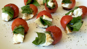 Bite-Size Caprese Appretizer Recipe With Tomatoes, Mozzarella, Basil, and Balsamic Drizzle