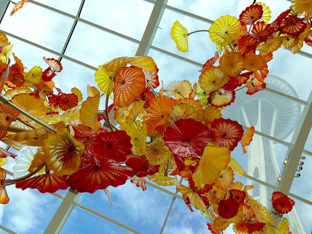 Chihuly Glass Flowers With Space Needle In Background