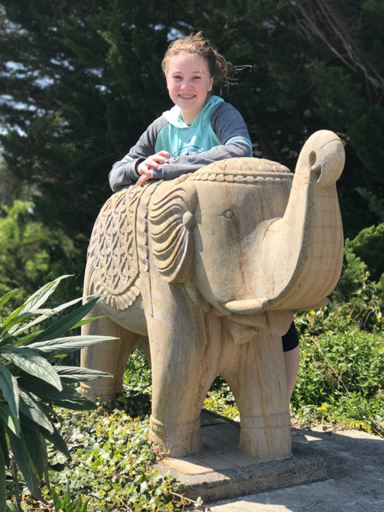 Natalie Bourn And Elephant Statues at a Yoga Studio in Point Arena