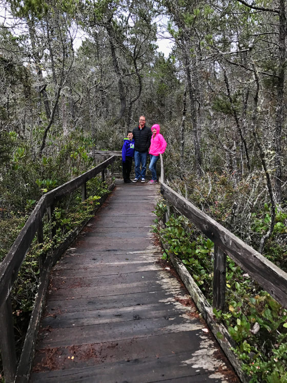 Carter, Brian, and Natalie on the Pygmy Forest Boardwalk at Van Damme State Park