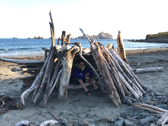 Carter Bourn in a Driftwood Fort
