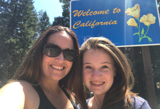 Jennifer and Natalie Bourn at the Welcome to California Sign