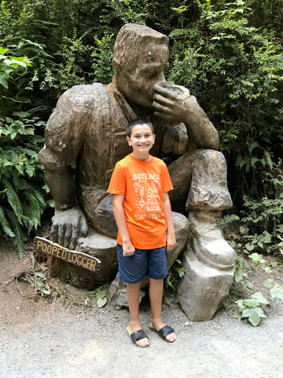 Carter at the Pooped Logger Statue
