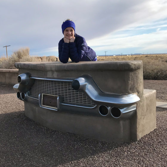 Natalie Bourn at the Route 66 Monument at Petrified Forest National Park