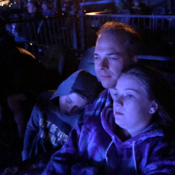 Brian Bourn Snuggling The Kids and Carter Sleeping During The Dead & Company Encore