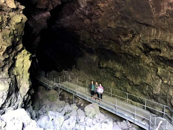 Jennifer, Carter, and Natalie Bourn entering Lava River Cave