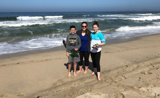 Jennifer, Natalie, and Carter Bourn Walking Along Francis State Beach