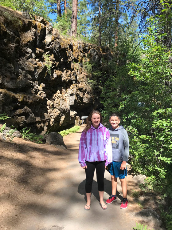 Natalie and Carter Bourn Walking The Short Trail To The Lava River Cave Entrance