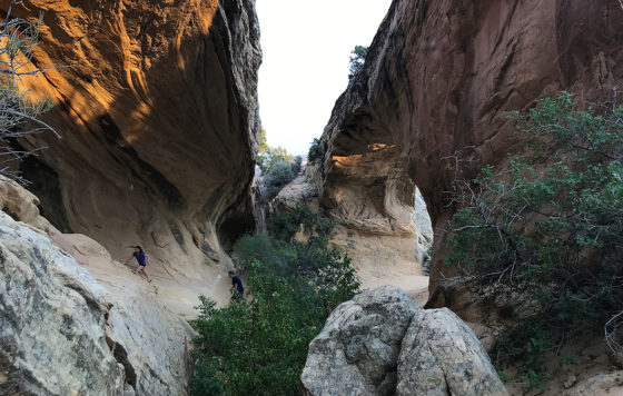 Natalie and Brian Bourn Exploring Moonshine Arch Cave