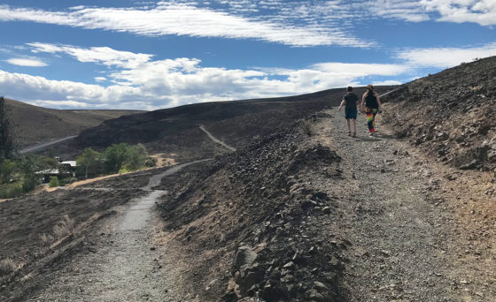 Carter and Natalie Bourn walking the trail at the Ginko Petrified Forest State Park in Vantage, Washington