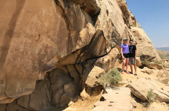Natalie And Carter Bourn Viewing Petroglyphs At DInosaur National Monument