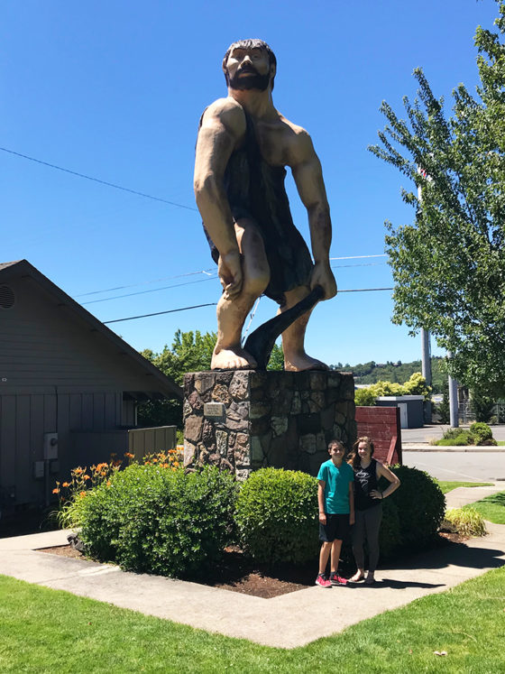 Natalie and Carter Bourn Visiting The Grants Pass Oregon Caveman Statue