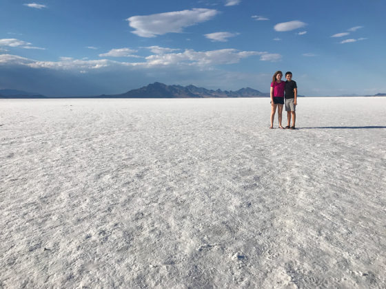 Natalie and Carter standing on the Bonneville Salt Flats