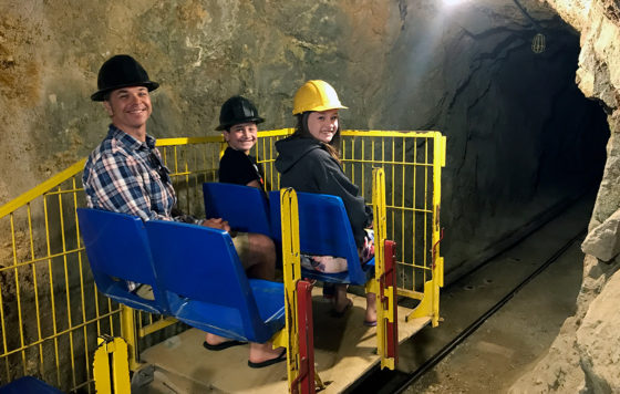 Brian, Carter, and Natalie Bourn Riding an Underground Tram Air Locomotive
