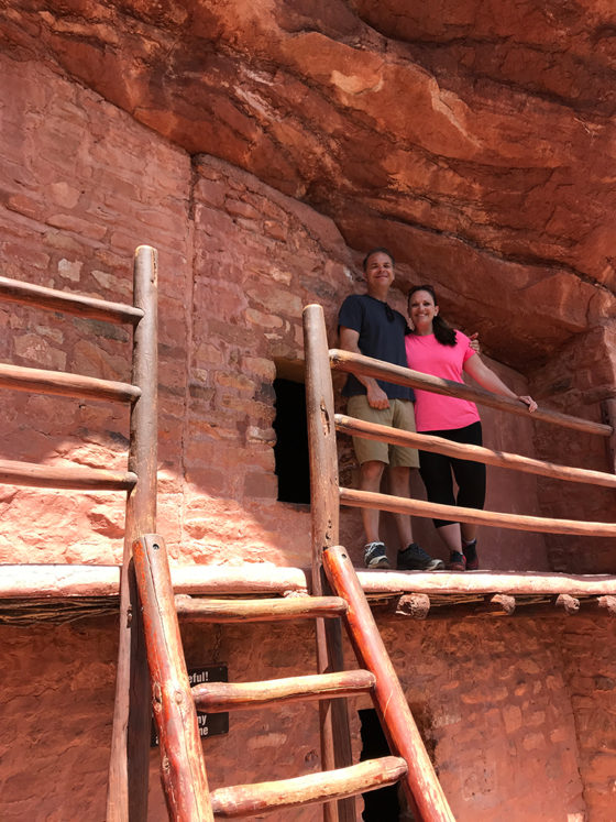 Brian and Jennifer Bourn exploring the second story of the cliff dwellings