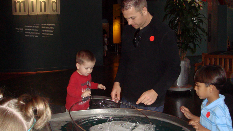 Brian and Carter Experimenting with bubbles at the Exploratorium