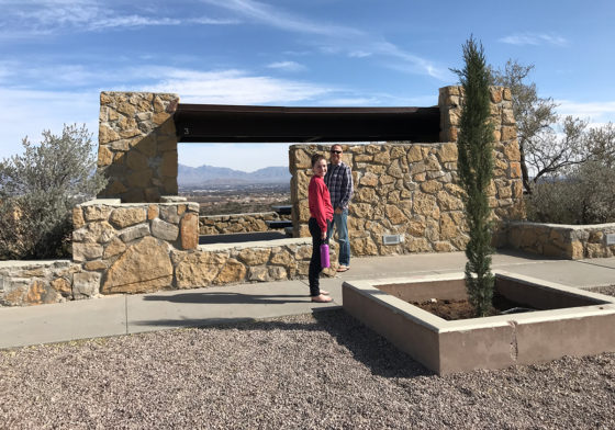 Natalie and Brian standing outside a picnic shelter at the Scenic View Rest Area in Las Cruces, New Mexico