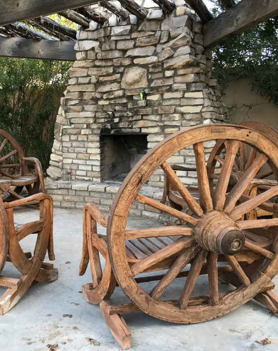 Wagon Wheel Chairs and Outdoor Fireplace