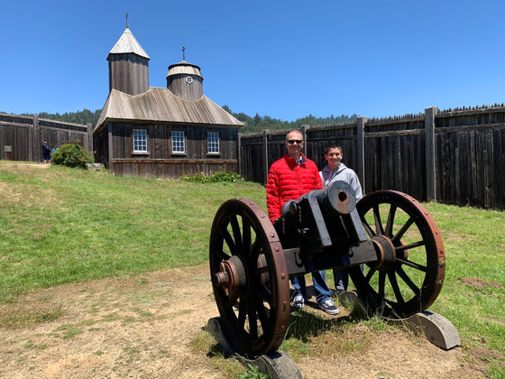 Brian and Carter Standing By A Cannon