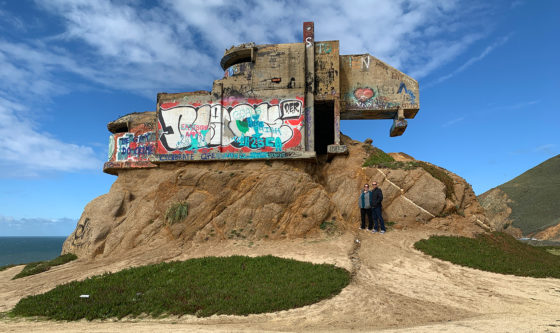 Brian and Jennifer Bourn standing near the Devil's Slide WWII Military Bunker Ruins